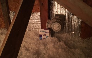 Isolation de toit, ajout de laine de fibre de verre